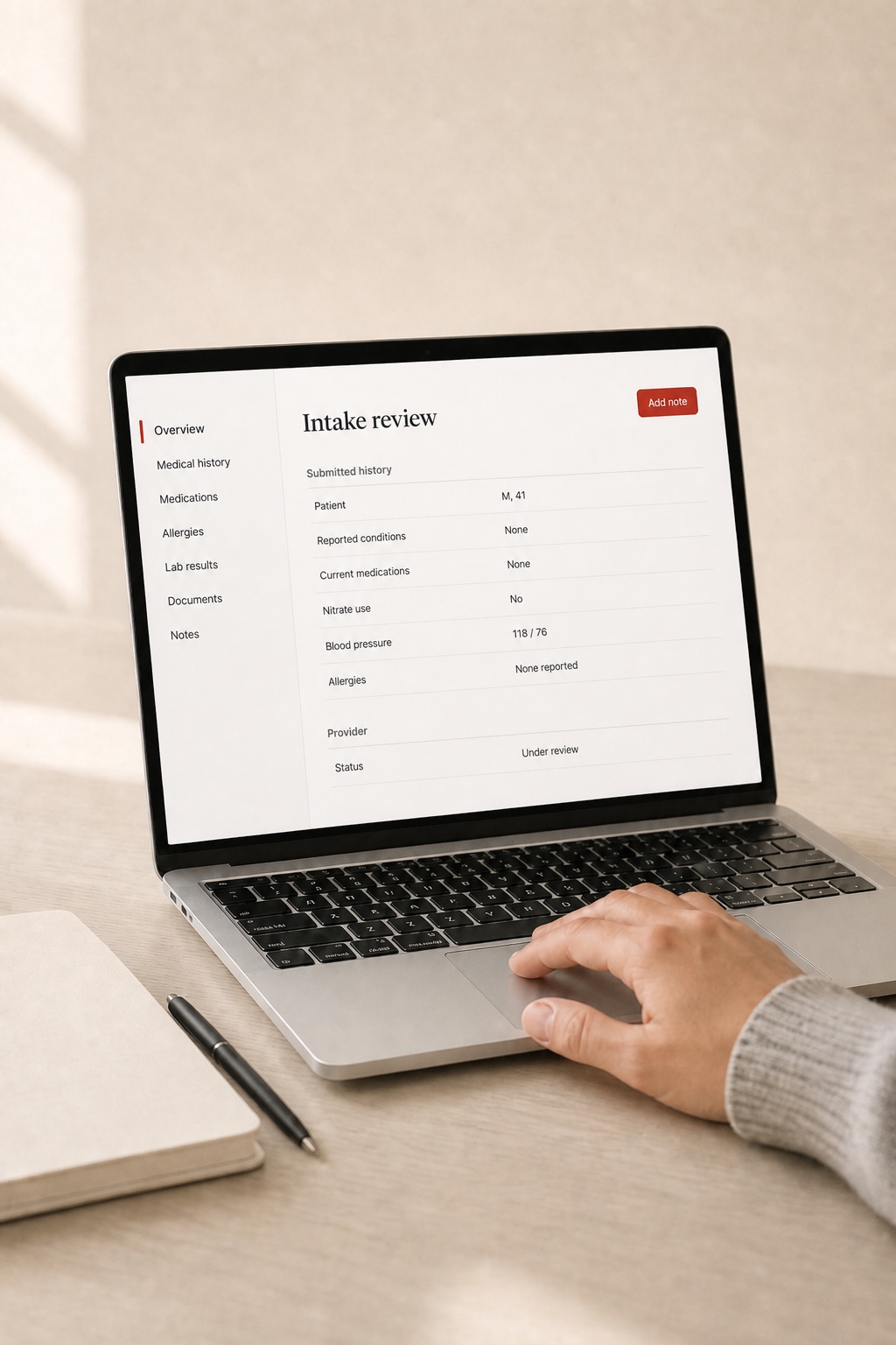 Laptop showing a submitted intake under review by a licensed provider